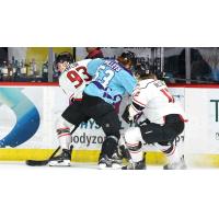 Adirondack Thunder forwards Justin Taylor (left) and Chase McLane fight for the puck vs. the Reading Royals