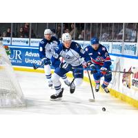 Syracuse Crunch defenseman Maxim Groshev eyes the puck vs. the Rochester Americans
