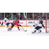 Belleville Senators defenceman Carter Yakemchuk (center) vs. the Springfield Thunderbirds