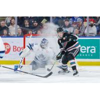 Penticton Vees' Ethan McCallum and Kelowna Rockets' Carson Wetsch in action