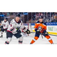 Adirondack Thunder defenseman Ryan Wheeler (left) vs. the Worcester Railers