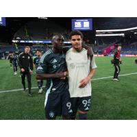 Seattle Sounders FC forwards Georgi Minoungou and Osaze De Rosario