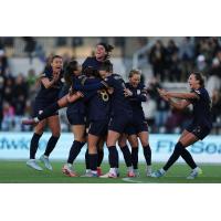 Seattle Reign FC celebrate a goal against the Kansas City Current