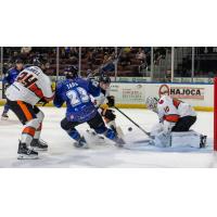 Wichita Thunder's Oliver Tarr versus Kansas City Mavericks' Thomas Farrell and Dylan Wells
