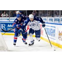 Syracuse Crunch center Lucas Mercuri with the puck vs. the Rochester Americans
