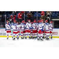 Kitchener Rangers exchange congratulations after a big win