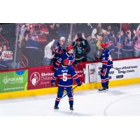 Spokane Chiefs gather after a big goal against the Prince George Cougars