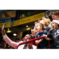 Young Oshawa Firewolves fans cheer on the team