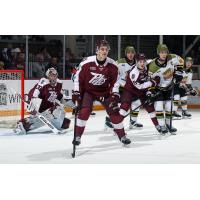Peterborough Petes defenceman Grayden Strohack (center) and goaltender Easton Rye vs. the North Bay Battalion