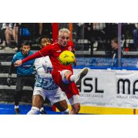 St. Louis Ambush defend against the Kansas City Comets