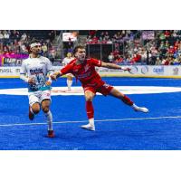St. Louis Ambush forward Mehrshad Ahmadi (left) vs. the Kansas City Comets