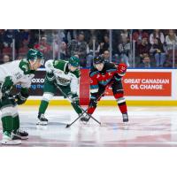 Kelowna Rockets right wing Carson Wetsch (right) vs. the Everett Silvertips