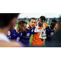 Louisville City FC huddle