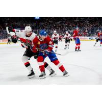 Belleville Senators defenceman Samuel Bolduc (left) vs. the Laval Rocket
