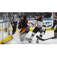 Wichita Thunder's Peter Bates battles the Kansas City Mavericks