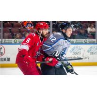 Wichita Thunder forward Peter Bates (right) vs. the Allen Americans
