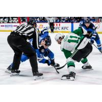 Texas Stars forward Harrison Scott faces off with the Manitoba Moose