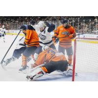 Greenville Swamp Rabbits goaltender Simon Latkoczy smothers a Jacksonville Icemen scoring attempt