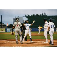 Biloxi Shuckers outfielder Jordyn Adams crosses home plate