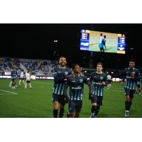 Rhode Island FC all smiles after a goal against the Charleston Battery