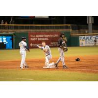 Mac Horvath of the Montgomery Biscuits safe at third