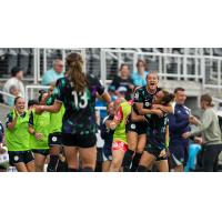 Lauren Milliet of Racing Louisville FC reacts after one of her goals