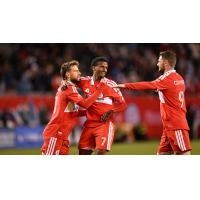 Chicago Fire FC's Philip Zinkernagel, Maren Haile-Selassie, and Hugo Cuypers on game night
