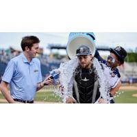 Biloxi Shuckers catcher Matthew Wood gets doused