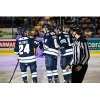 Penticton Vees discuss a score
