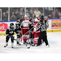 Allen Americans discuss the game with the Idaho Steelheads