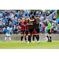 Atlanta United gathers after a goal against Charlotte in the U.S. Open Cup quarterfinals