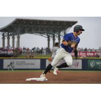 Pensacola Blue Wahoos round the bases