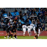 Colorado Springs Switchbacks FC celebrate Brennan Creek's goal with the crowd