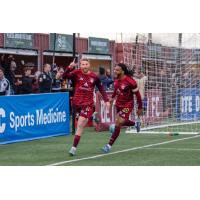 Detroit City FC forward Connor Rutz (left) and defender Rio Hope-Gund