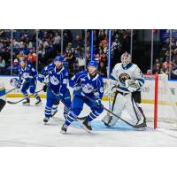 Syracuse Crunch centers Dylan Duke (left) and Matthew Peca vs. the Cleveland Monsters