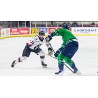 Adirondack Thunder forward Alex Campbell (left) vs. the Maine Mariners