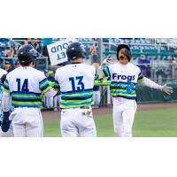 Curtis Washington Jr. of the Everett AquaSox comes in to score