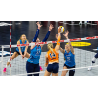 Omaha Supernovas opposite hitter Emily Londot (27) and middle blocker Kiara Reinhardt up front with outside hitter Brooke Nuneviller in back