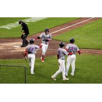 Worcester Red Sox shortstop Nick Sogard accepts congratulations after his three-run home run