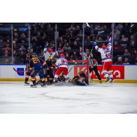 Dylan Edwards of the Kitchener Rangers (far right) reacts after his goal in double overtime