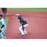 Lake Erie Crushers outfielder Joe Redfield leads off first