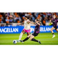 San Diego Wave FC forward Trinity Byars (left) vs. the Houston Dash