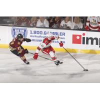Grand Rapids Griffins defenseman Anton Johansson with the puck against the Chicago Wolves
