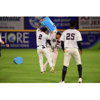 Manny Palencia of the Somerset Patriots gets doused after his walk-off hit