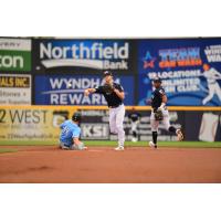 Owen Cobb of the Somerset Patriots throws to first