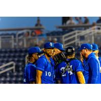 Biloxi Shuckers huddle on the mound