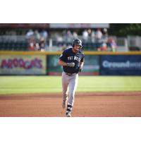 Garrett Martin of the Somerset Patriots rounds the bases