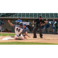 Lincoln Saltdogs outfielder Tanner O'Tremba slides home