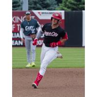 Dillon Tatum of the Sioux City Explorers rounds the bases
