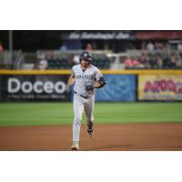 Garrett Martin of the Somerset Patriots rounds the bases